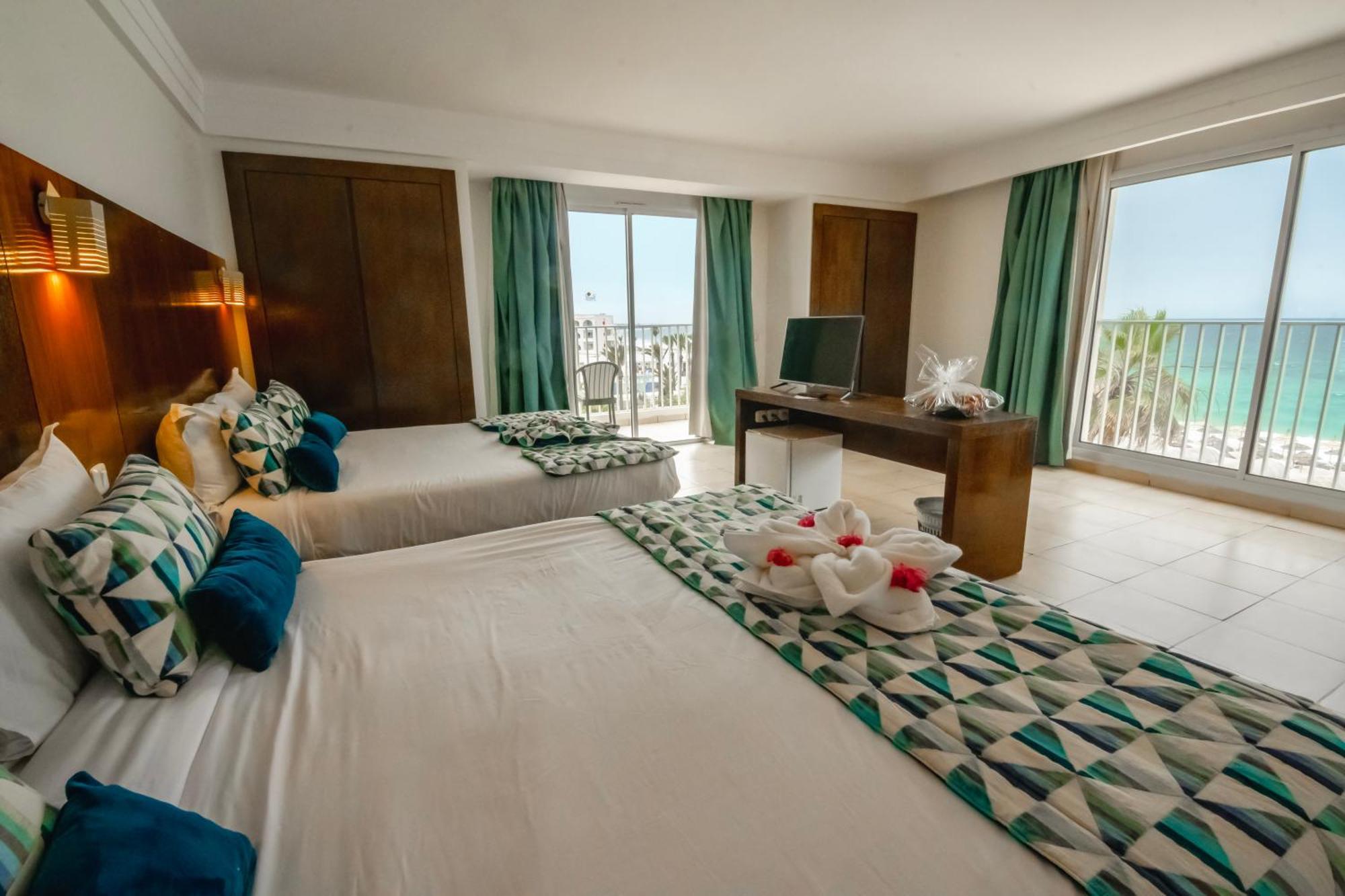 Dreibettzimmer mit Meerblick